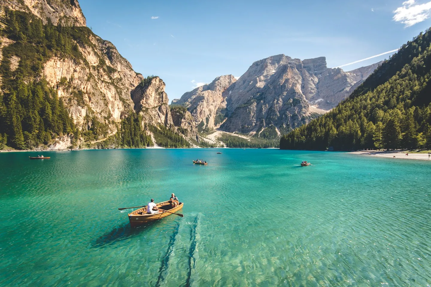 Small boats on a turquoise lake
